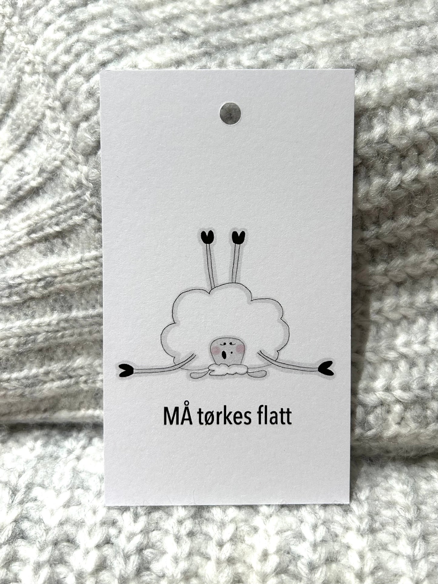 Må tørkes flatt